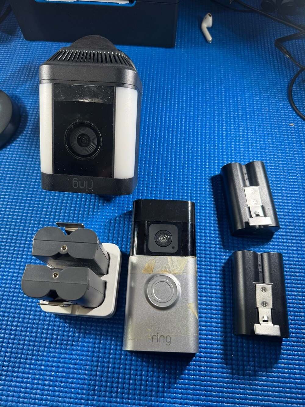 Ring Spotlight Cam Plus, Ring Video Doorbell Plus, and 4x Battery Packs